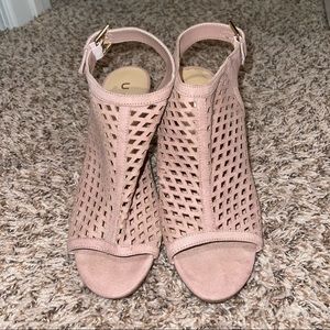 Peep toe suede heels